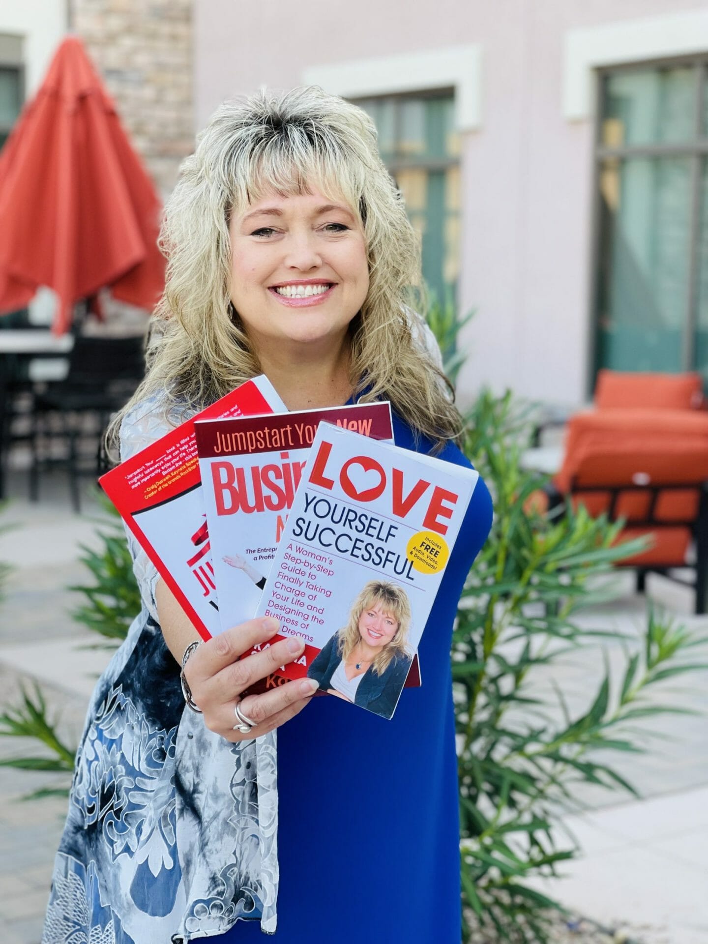 Katrina Sawa Holding Books